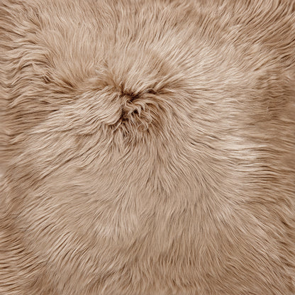 The Mood Charlie Sheepskin in a sandy brown color, color swatch