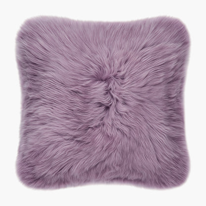The Mood Charlie Sheepskin Double-sided Square Pillow in a deep mauve purple color, on a white background, front view