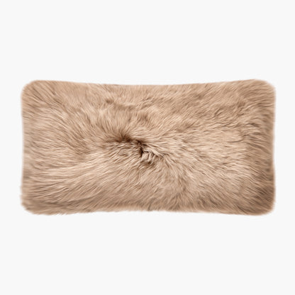 The Mood Charlie Sheepskin Double-sided Lumbar Pillow in a sandy brown color, on a white background, front view
