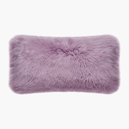 The Mood Charlie Sheepskin Double-sided Lumbar Pillow in a deep mauve purple color, on a white background, front view