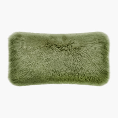 The Mood Charlie Sheepskin Double-sided Lumbar Pillow in a green-tea color, on a white background, front view