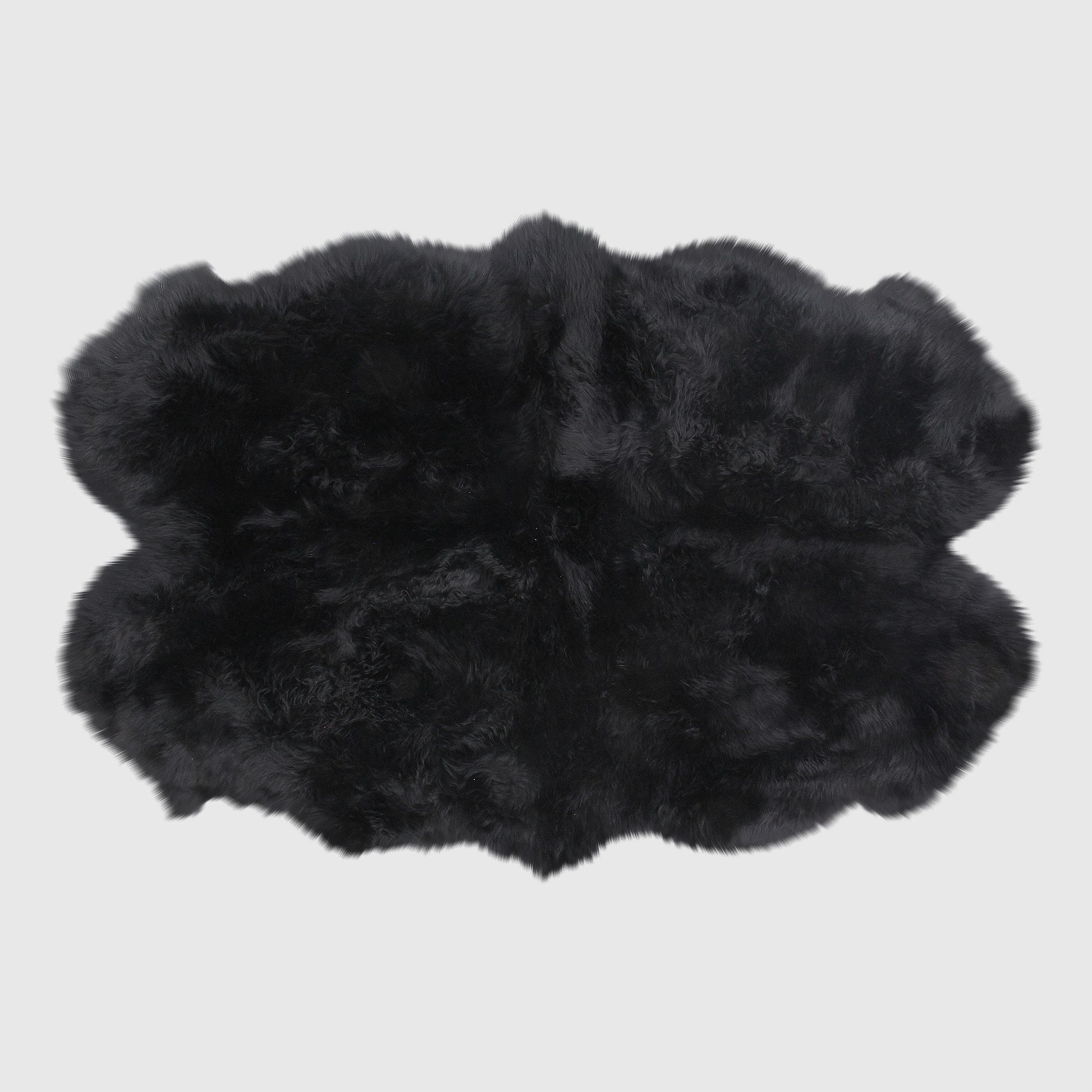 The Mood Charlie Sheepskin Quarto Pelt Rug, Black